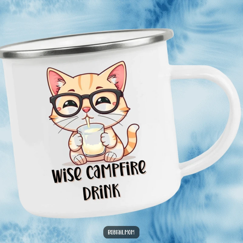 Funny camping mug featuring a Bobtail cat wearing reading glasses and sipping milk, a durable and humorous companion for outdoor thinking.
