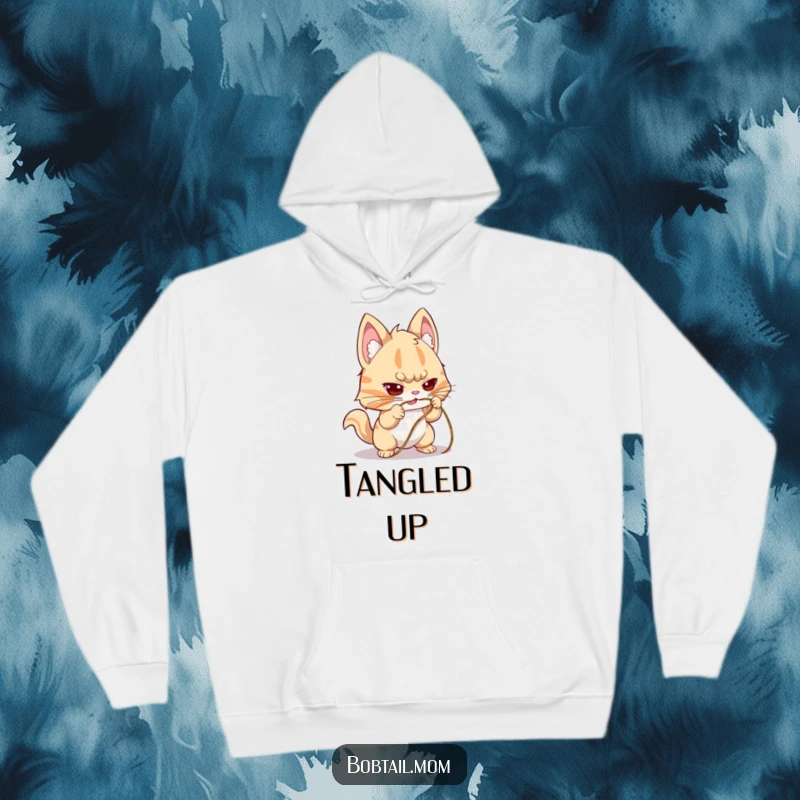 Funny Bobtail Hoodie illustrating a dog with a determined expression, working to untangle a string, ideal for cozy focus.