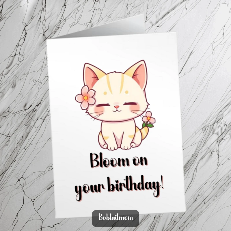 Funny Free Printable Birthday Card: A bobtail cat with a flower behind its ear looks wonderfully serene.