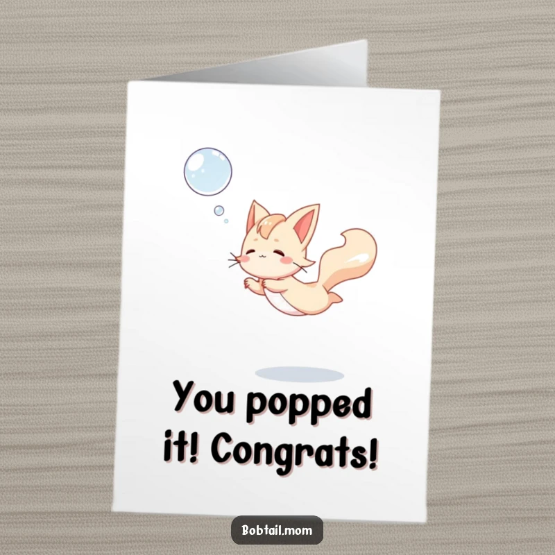 Funny Free Printable Congrats Card: A Bobtail cat joyfully leaps mid-air to catch a floating bubble, a moment of pure delight.